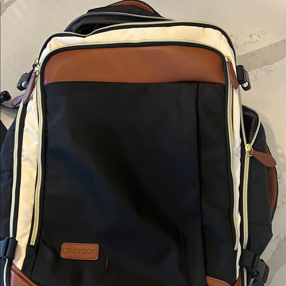 Black Brown cream backpack. Lovevook.
